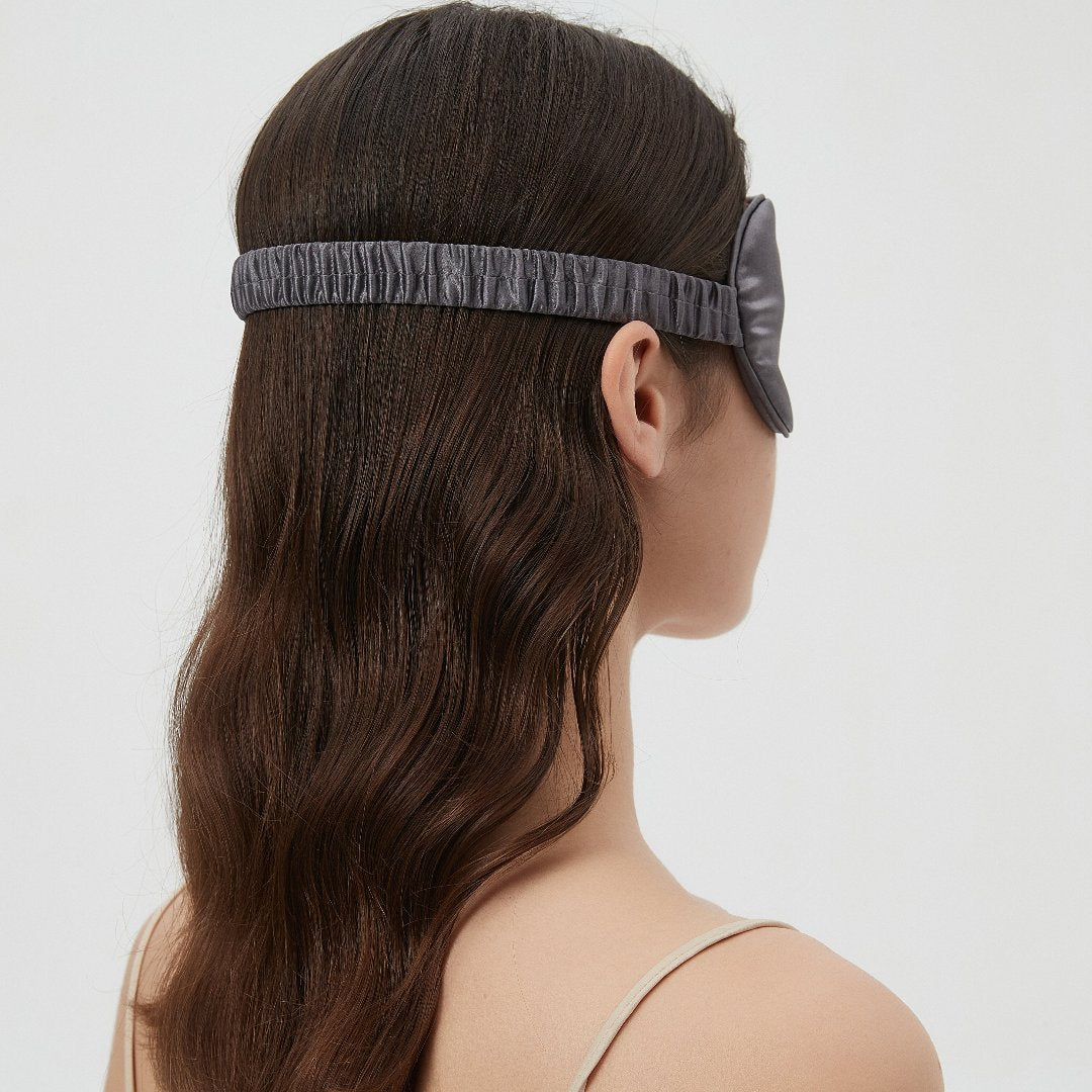 cMari Ann champagne silk sleep mask with an elastic band for a comfortable, secure fit, providing luxurious softness and restful sleep.