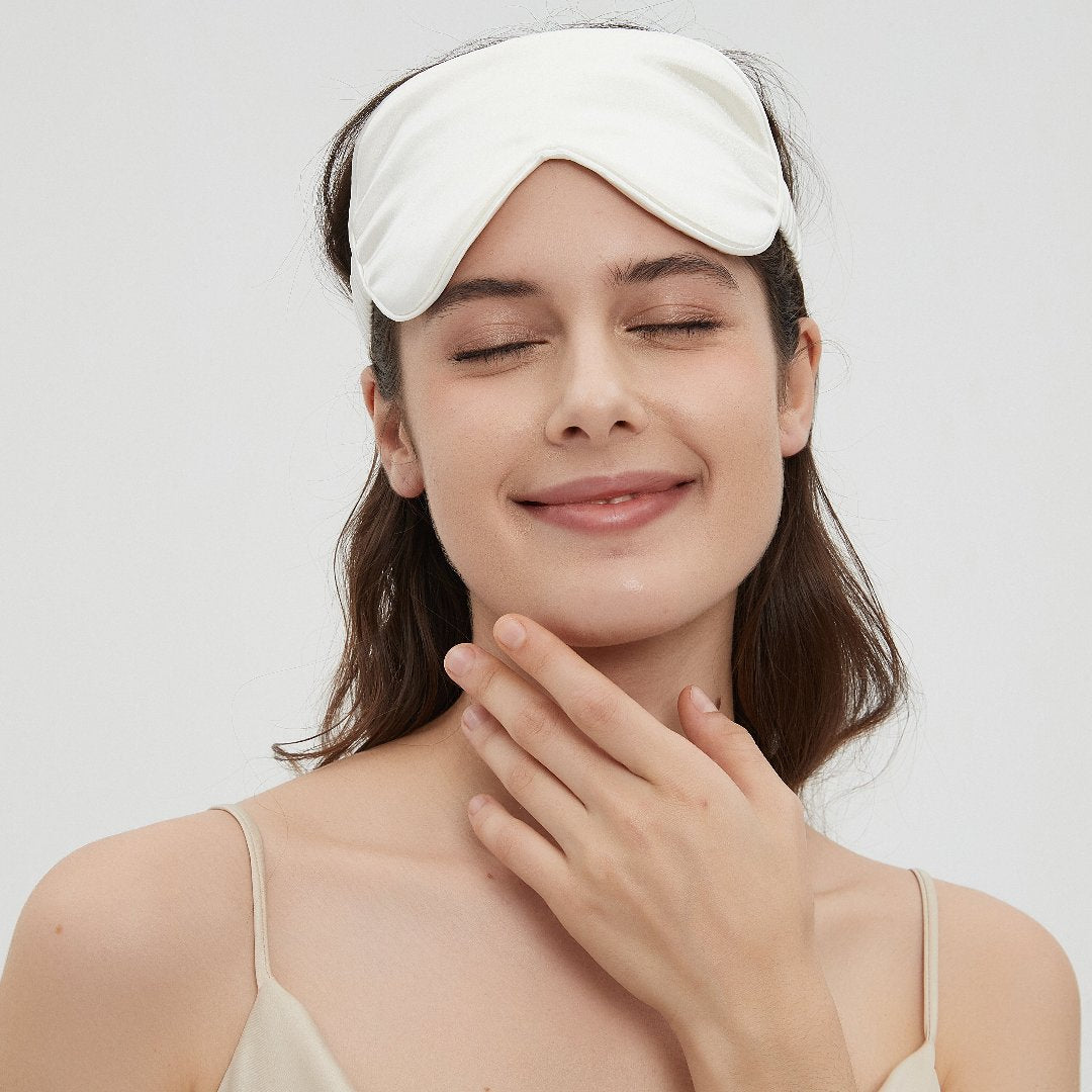 Luxurious Charmeuse silk sleep mask in white by Perle Silk, ultra-soft and breathable, designed for ultimate comfort and restful sleep.