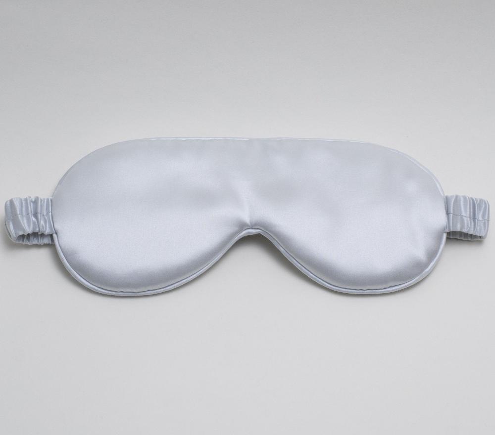 Mari Ann silk sleep mask in blue color, crafted from ultra-soft and smooth silk, offering luxurious comfort and a perfect fit for restful sleep.