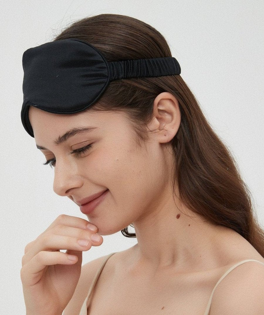 Luxurious Charmeuse silk sleep mask by Perle Silk, featuring ultra-soft and smooth fabric, hypoallergenic properties, and a comfortable fit for restful sleep and relaxation.