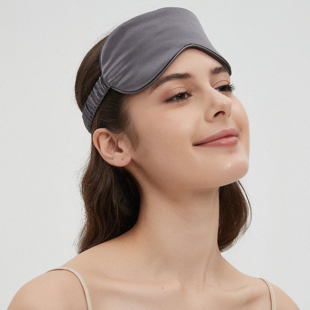 Luxurious Charmeuse silk sleep mask  in grey color by Perle Silk, ultra-soft and breathable, designed for ultimate comfort and restful sleep.